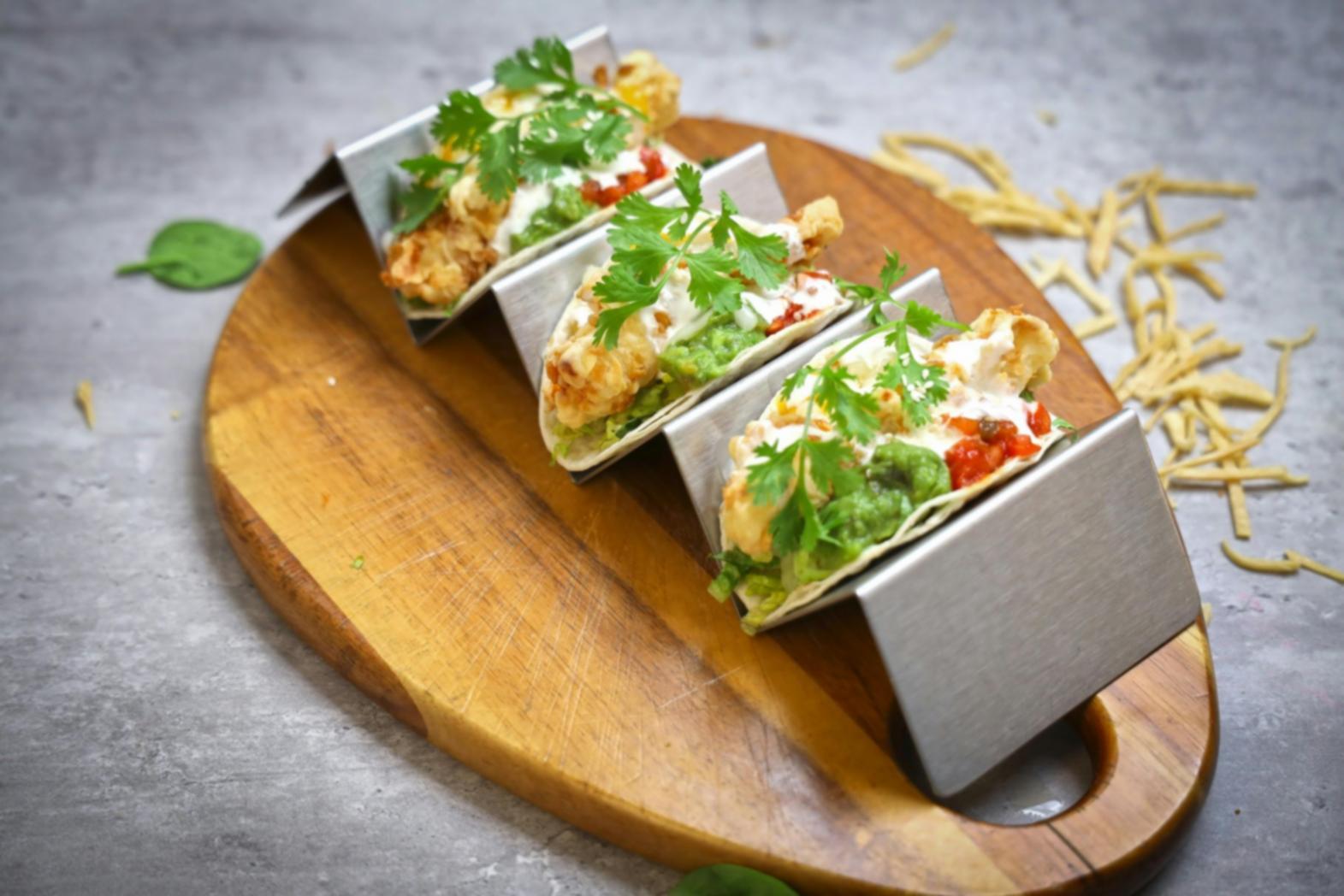 Kitchen‑Club cooking workshop with students preparing traditional dishes